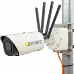 The avisec construction camera mounted on a pole. The brand name "avisec" is written on the housing.